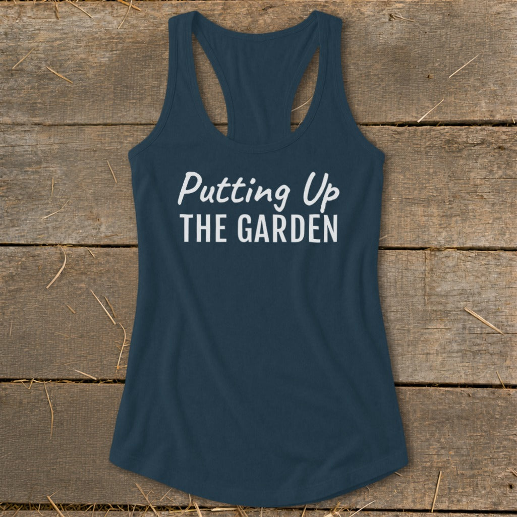 Navy tank top with white text "Putting Up THE GARDEN"