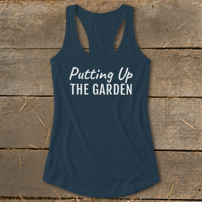 Navy tank top with white text "Putting Up THE GARDEN"