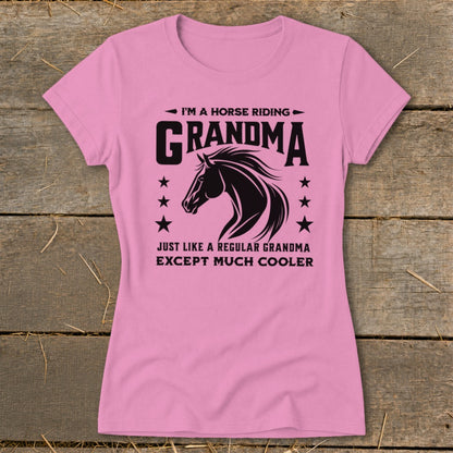 Pink t-shirt with "I'm a horse riding Grandma" text and horse graphic.