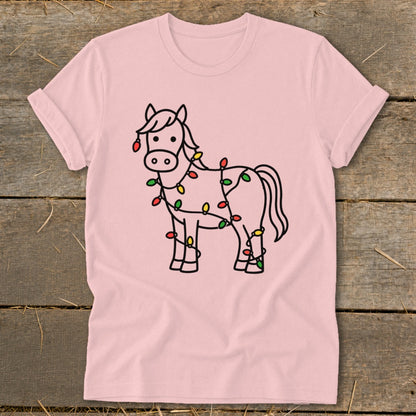 Pink t-shirt with a cartoon horse wrapped in colorful Christmas lights.