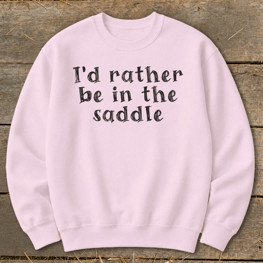 Pink sweatshirt with black text: "I'd rather be in the saddle".