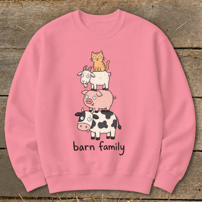 Pink sweatshirt with cartoon barn animals stacked and "barn family" text.
