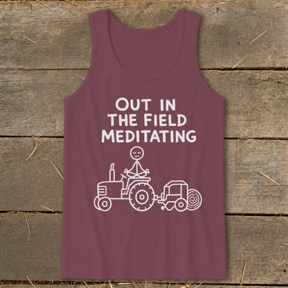 Maroon tank top with "Out in the Field Meditating" text and tractor graphic.
