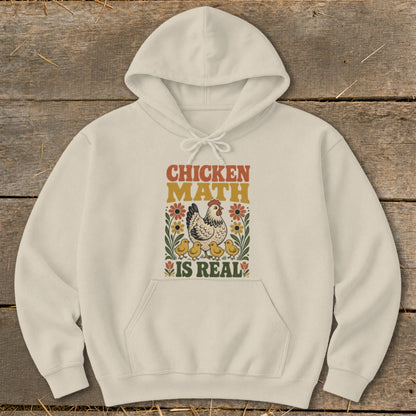 Cream hoodie with "Chicken Math is Real" graphic featuring chickens and flowers.