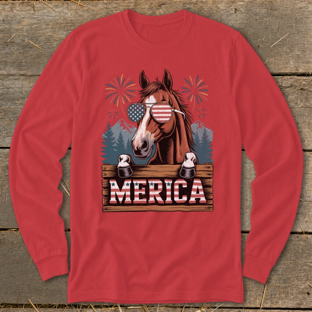 Horse wearing American flag sunglasses and text "MERICA" on a wooden sign.