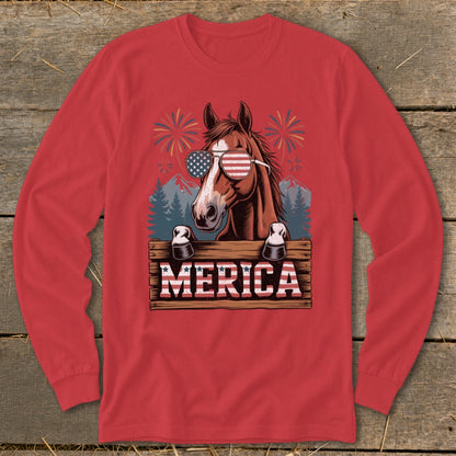 Horse wearing American flag sunglasses and text "MERICA" on a wooden sign.