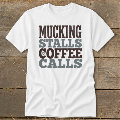 White t-shirt with text: Mucking Stalls & Coffee Calls.
