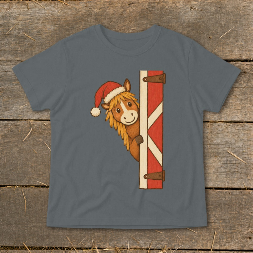 Cartoon horse wearing a Santa hat peeking around a barn door.