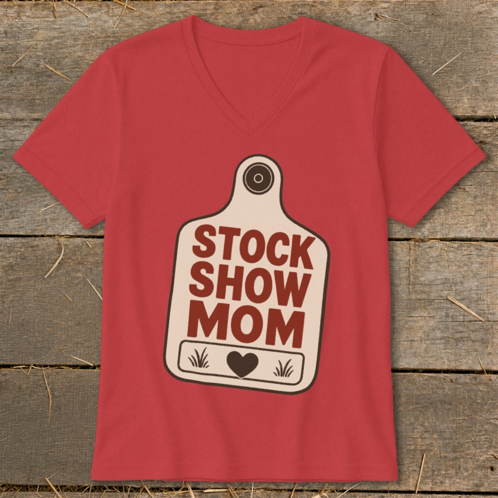 Red v-neck t-shirt with "STOCK SHOW MOM" graphic on a tag.