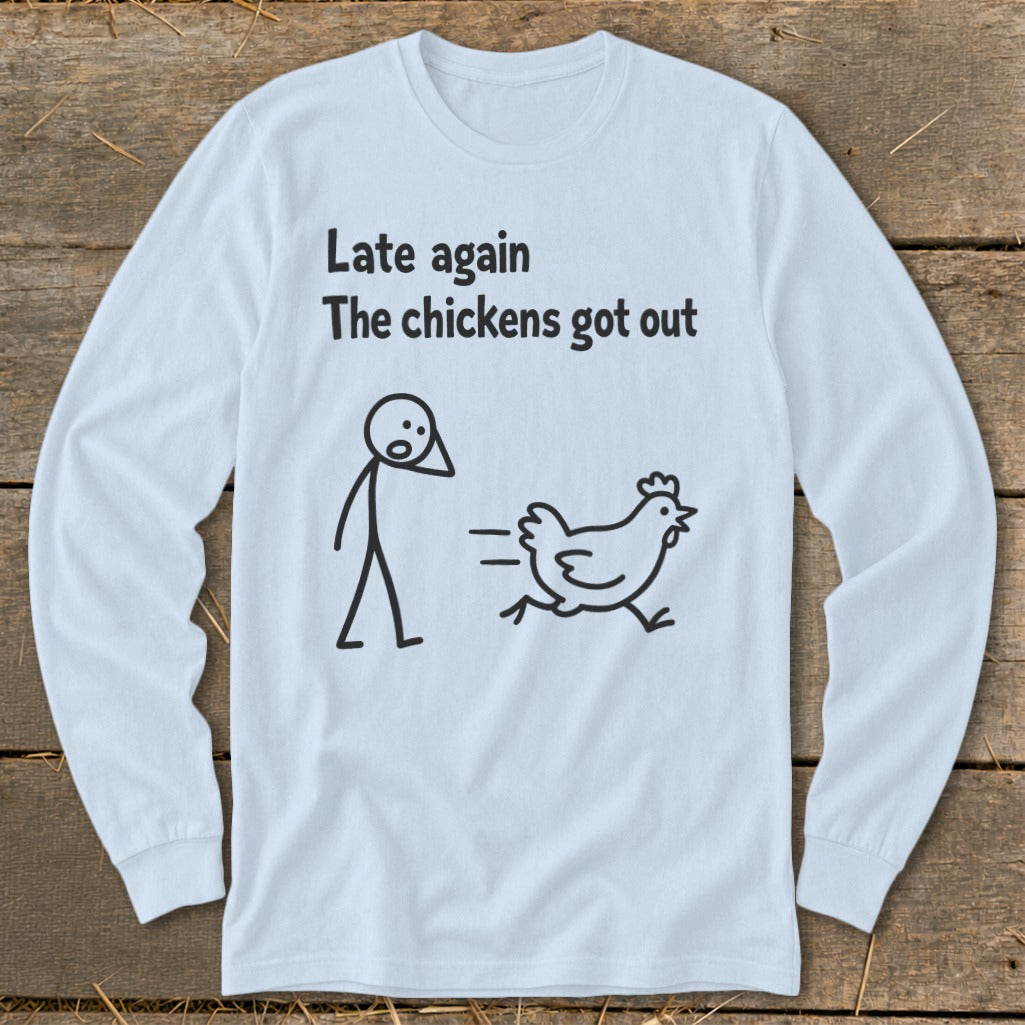 Light blue long-sleeve shirt with "Late again The chickens got out" text and cartoon.