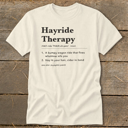 Cream t-shirt with "Hayride Therapy" definition: bumpy wagon ride, hay in hair, cider.