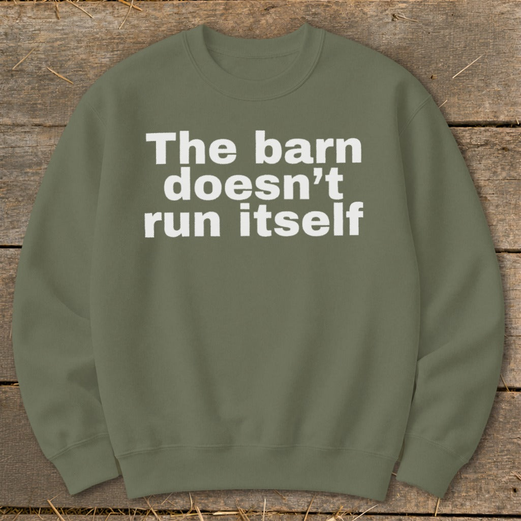 Olive green sweatshirt with white text reading "The barn doesn't run itself".