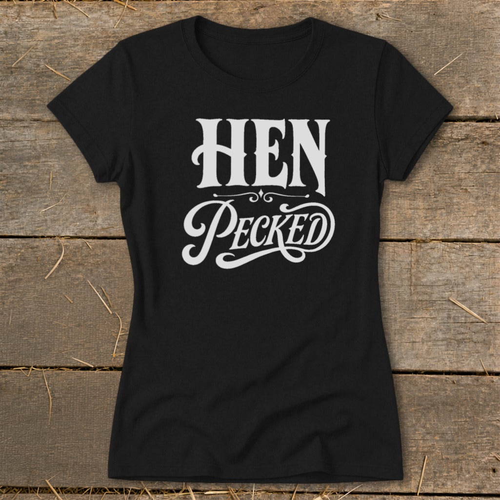 Black t-shirt with white text that reads "HEN PeckED" in decorative fonts.