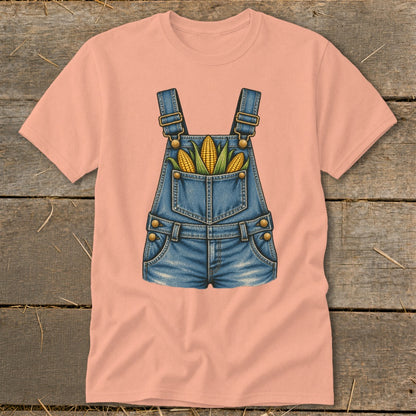 Peach t-shirt with denim overalls and corn graphic on the front.