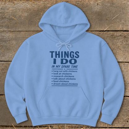 Light blue hoodie with "Things I Do In My Spare Time" text about chickens.