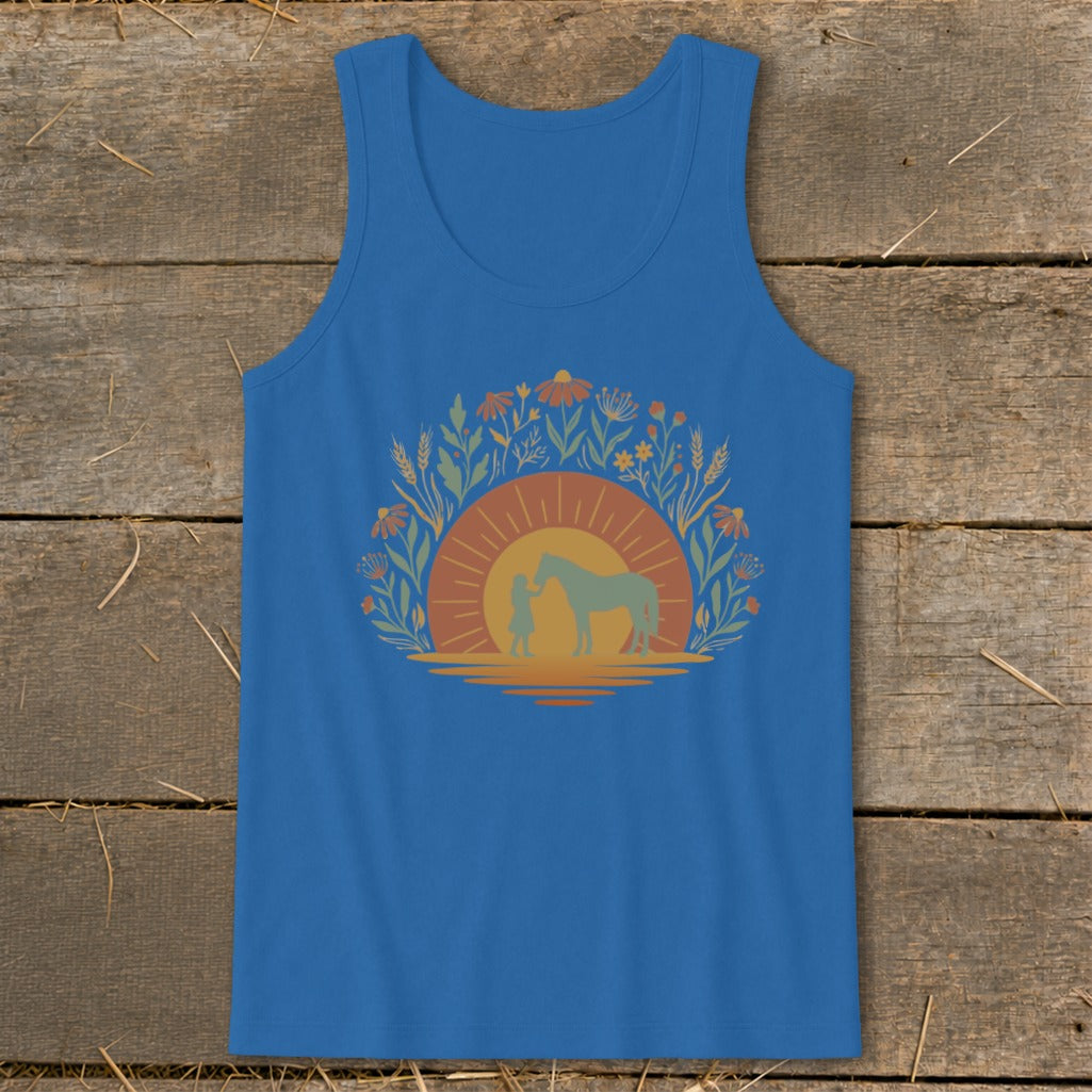 Blue tank top with graphic of girl and horse at sunset surrounded by flowers.