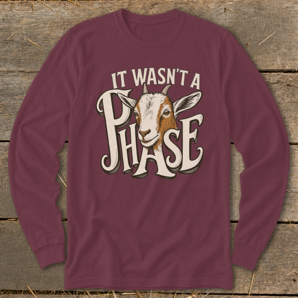 Maroon long sleeve shirt with a goat and text that reads "IT WASN'T A PHASE".