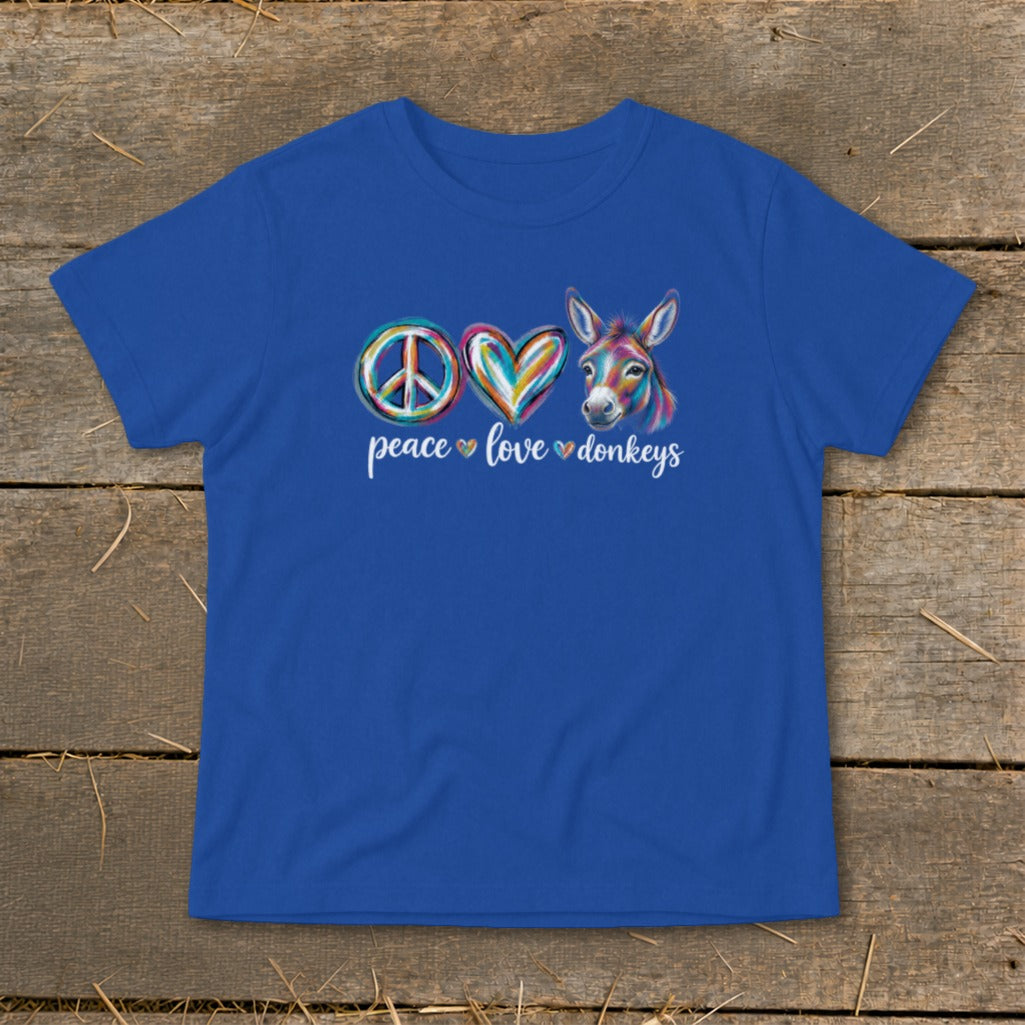 Royal blue t-shirt with peace sign, heart, and donkey art with text.