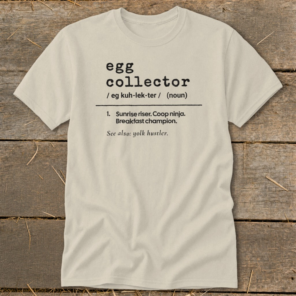 Light beige t-shirt with black text defining "egg collector."