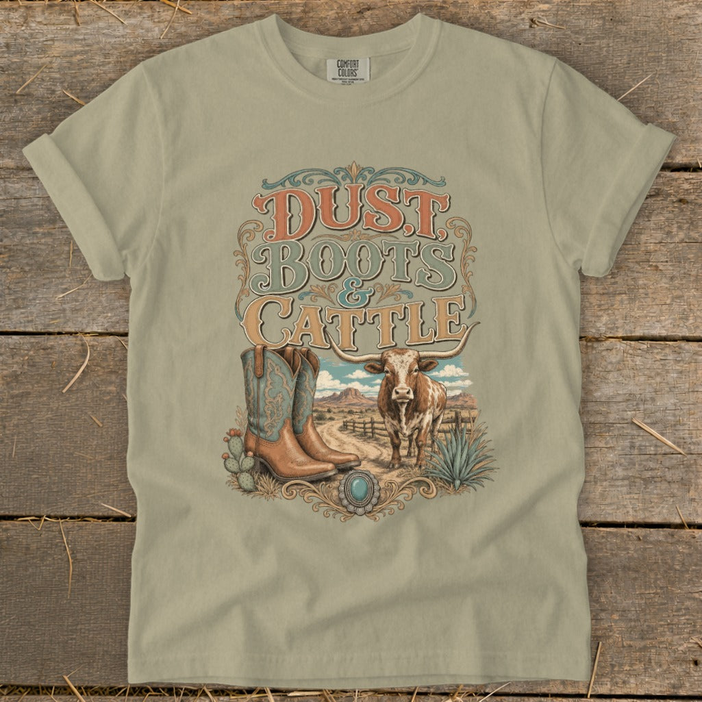 T-shirt graphic with "Dust Boots & Cattle" text, cowboy boots, and longhorn steer.