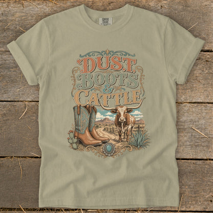 T-shirt graphic with "Dust Boots & Cattle" text, cowboy boots, and longhorn steer.