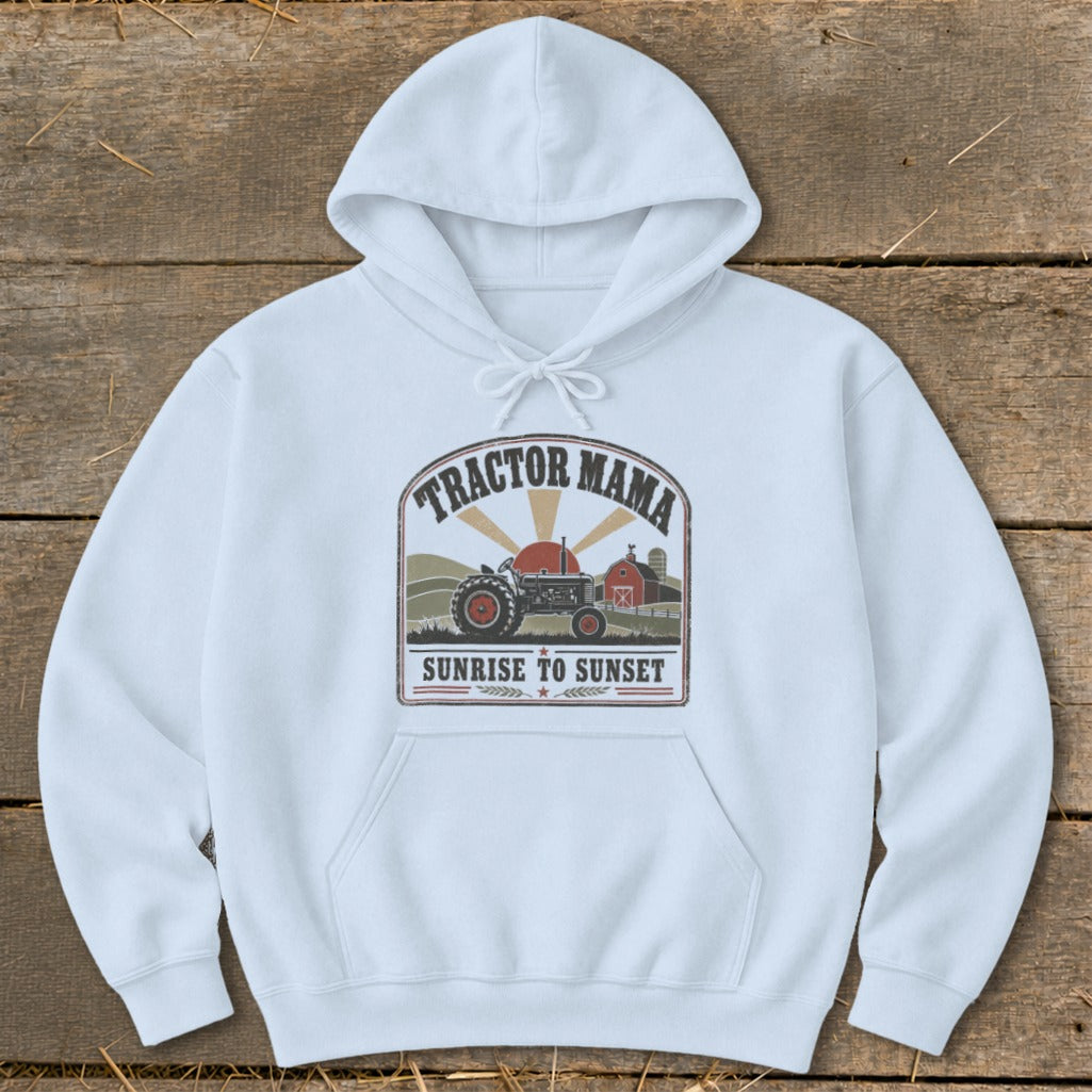 White hoodie with "Tractor Mama Sunrise to Sunset" graphic featuring a tractor and barn.
