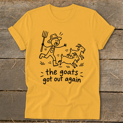 Yellow t-shirt with stick figure farmer chasing goats, text reads "the goats got out again".