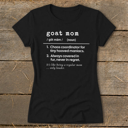 Black t-shirt with white text defining "goat mom" as chaos coordinator for tiny hooved maniacs.