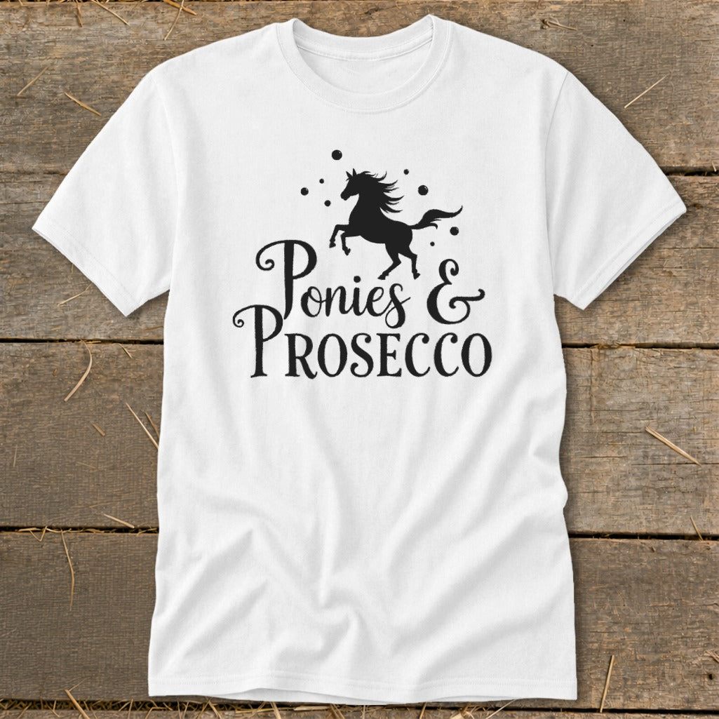 White t-shirt with black graphic of a horse and text "Ponies & Prosecco".