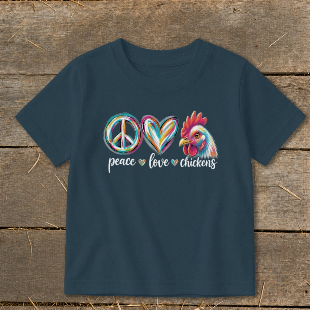Dark blue t-shirt with a colorful peace sign, heart, and rooster graphic reading "peace love chickens".