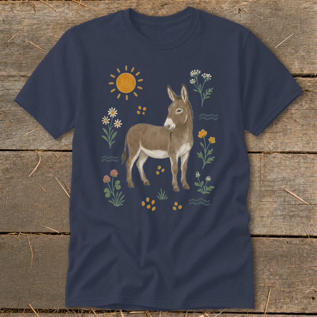 Navy t-shirt with a watercolor-style illustration of a donkey surrounded by flowers and a sun.