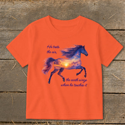 Bright orange short-sleeved children's t-shirt printed with a running horse silhouette containing a sunset sky and text.