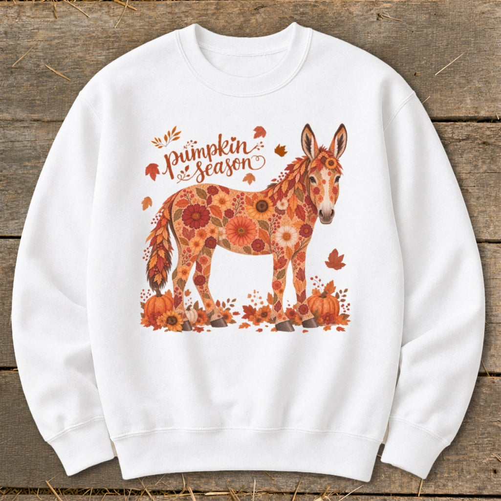 Donkey with floral pattern and text "Pumpkin Season" surrounded by autumn leaves and pumpkins.