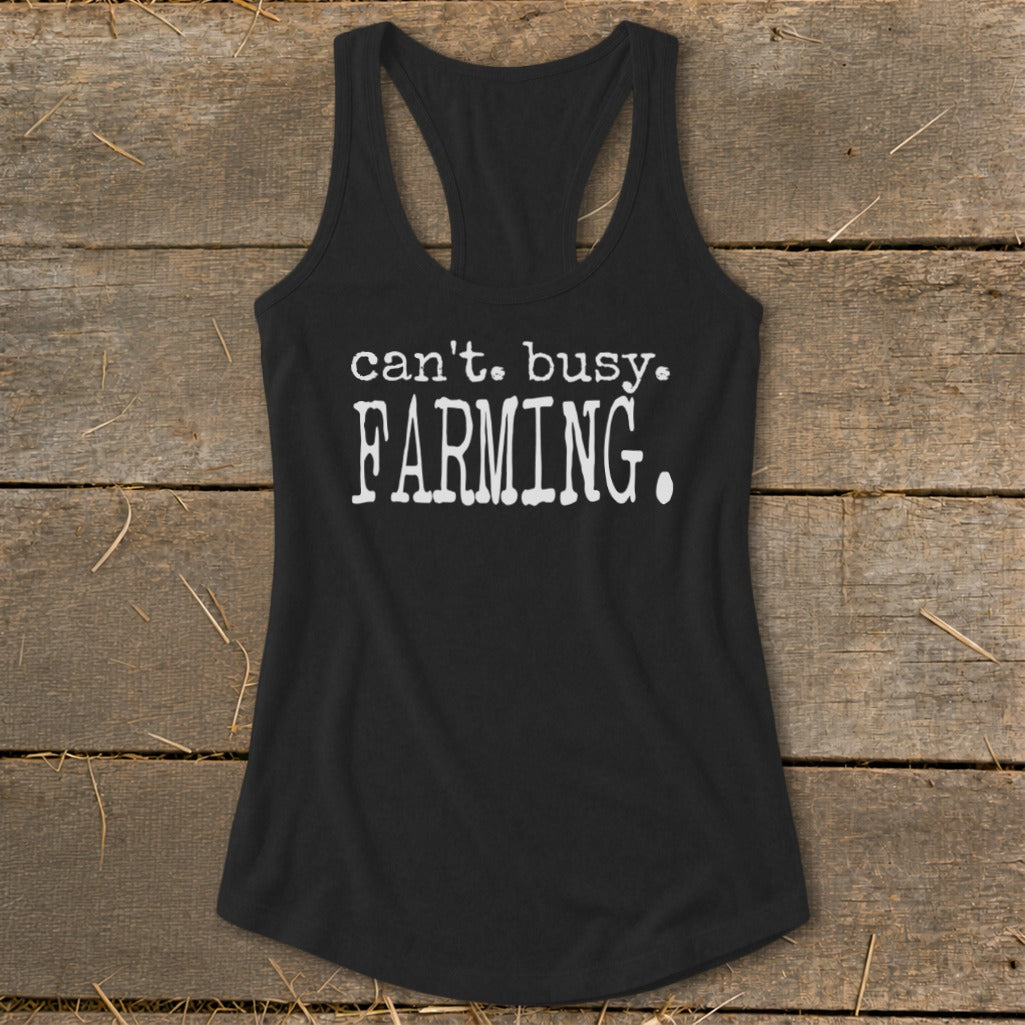 Black racerback tank top with white text "can't. busy. FARMING."
