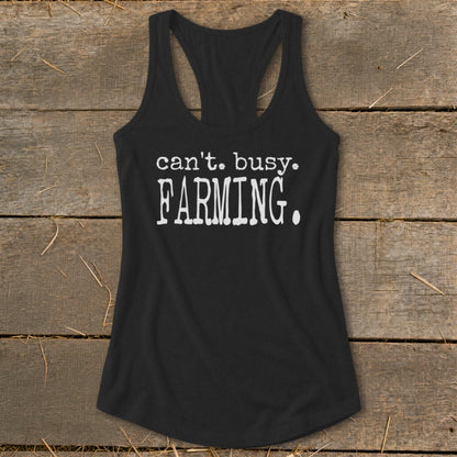 Black racerback tank top with white text "can't. busy. FARMING."