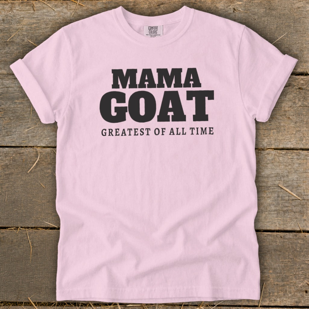 Light pink t-shirt with "MAMA GOAT GREATEST OF ALL TIME" text.