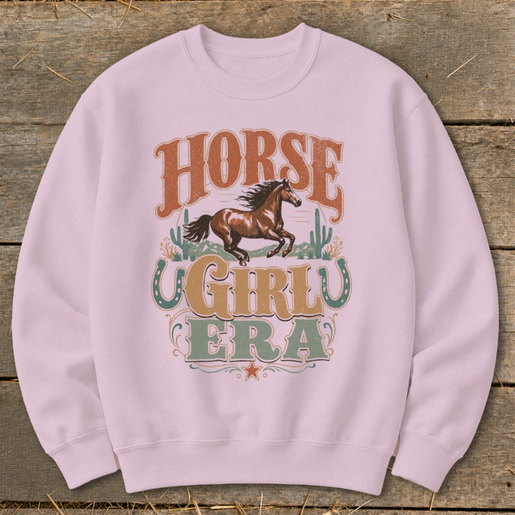 Pink sweatshirt with "HORSE GIRLY ERA" text and a running horse graphic.