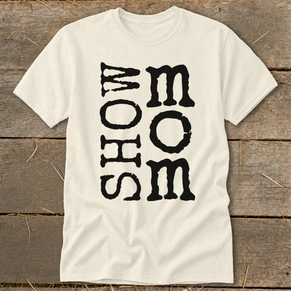 Cream t-shirt with "SHOW MOM" text in black, stylized lettering.