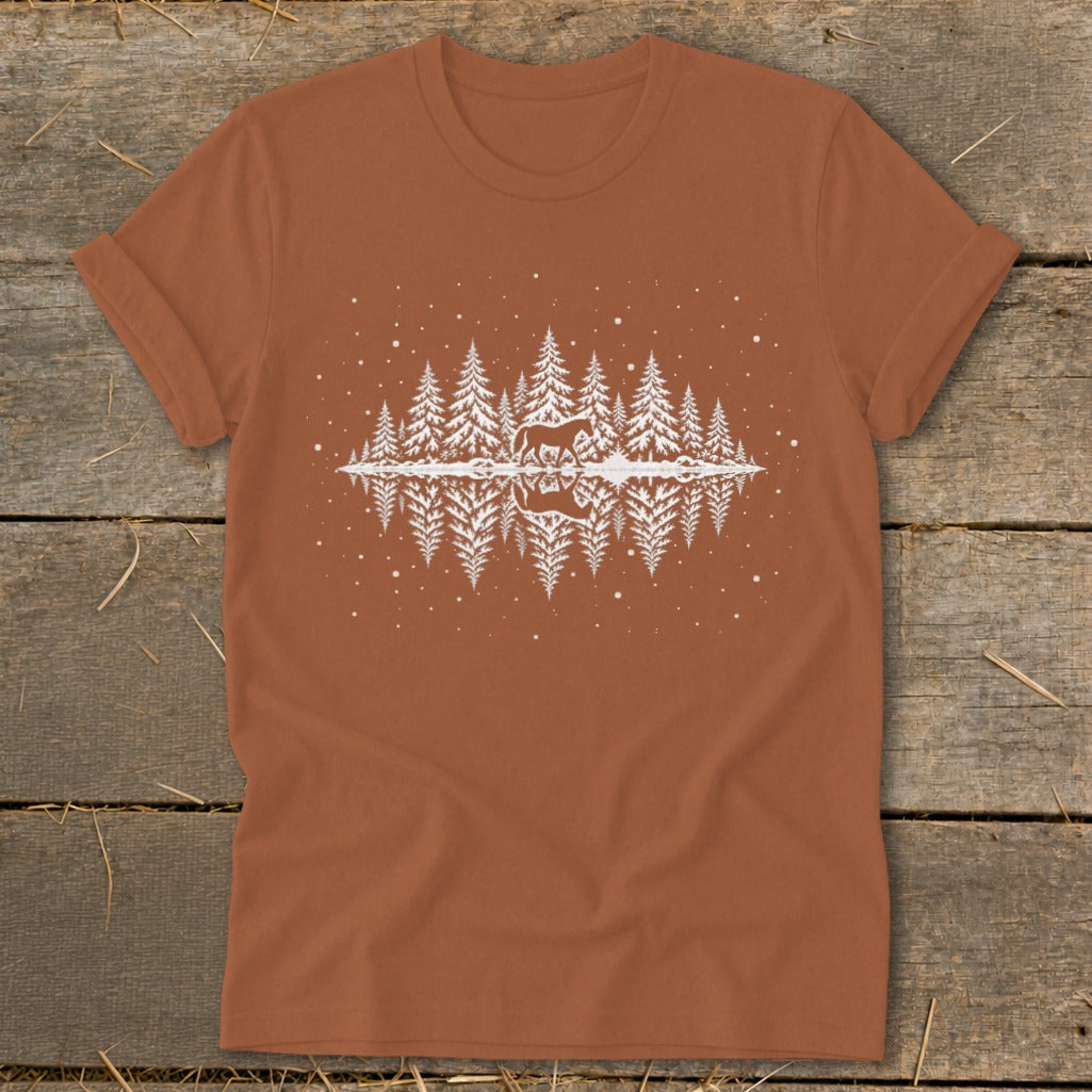 T-shirt with white graphic of horse, pine trees, and reflection in water.