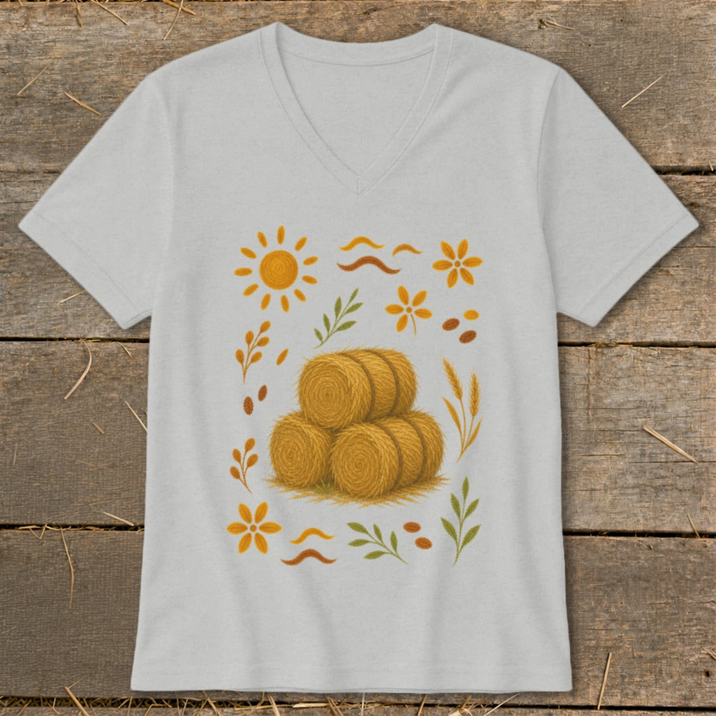Light grey t-shirt with stacked hay bales and autumnal floral graphic.