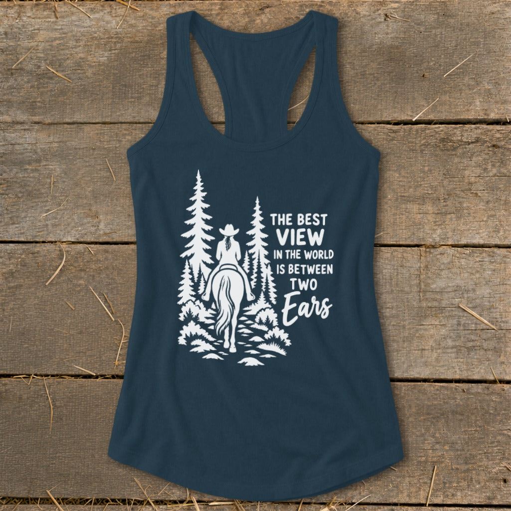 Dark blue women's tank top featuring a white equestrian graphic and text on a rustic wooden background.