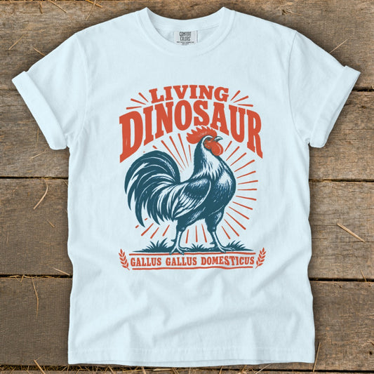 White t-shirt with "Living Dinosaur" and a rooster graphic, "Gallus Gallus Domesticus" text.