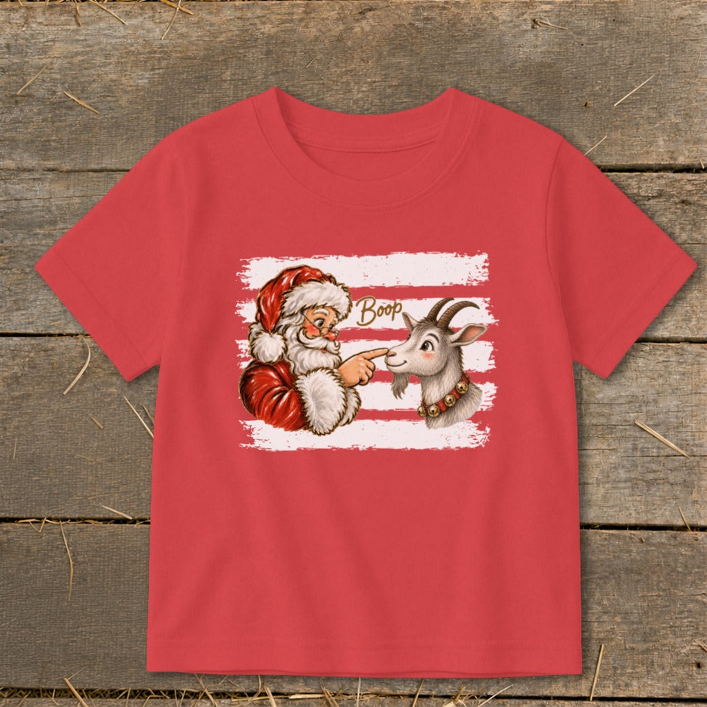 Santa boops a goat on the nose with the word "Boop" in script.