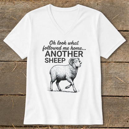 White v-neck t-shirt with text and a drawing of a sheep.