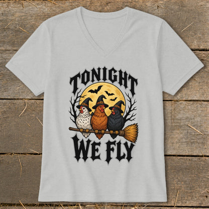 Three witch-hatted chickens sit on a broomstick under a full moon with text "TONIGHT WE FLY".