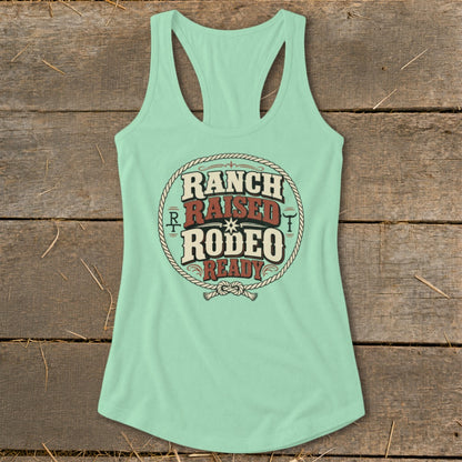 Mint green tank top with "Ranch Raised Rodeo Ready" text inside a rope circle.