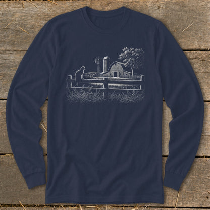 White line drawing on navy shirt shows cat on fence, barn, windmill, and tree.
