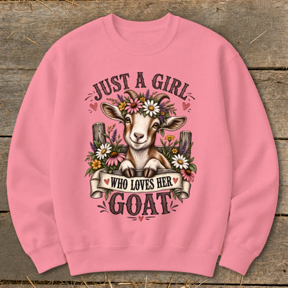 Pink sweatshirt with a goat wearing a flower crown and text "Just a girl who loves her goat".