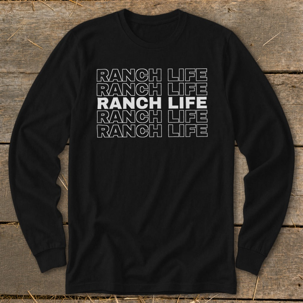 A black long-sleeve t-shirt with five rows of stacked white text that reads RANCH LIFE.