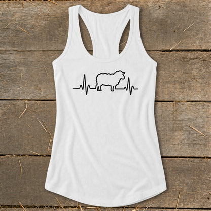 A white women's racerback tank top featuring a black sheep silhouette integrated into a heartbeat line.